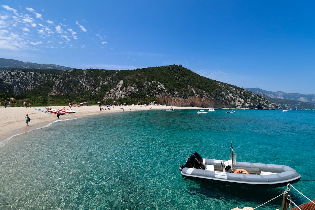 a boat tied to a rope in the water