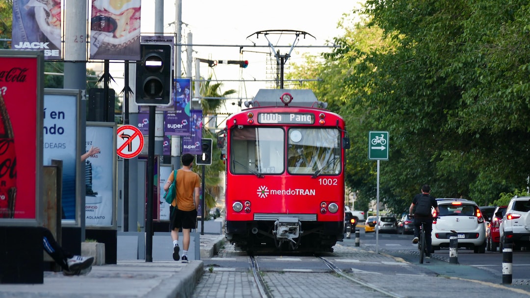 a red trolley on the street