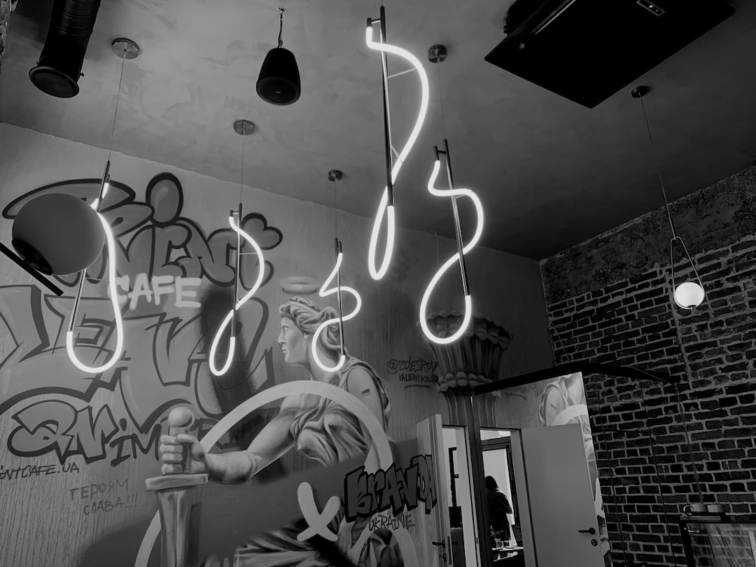 a wall with lights and a sign