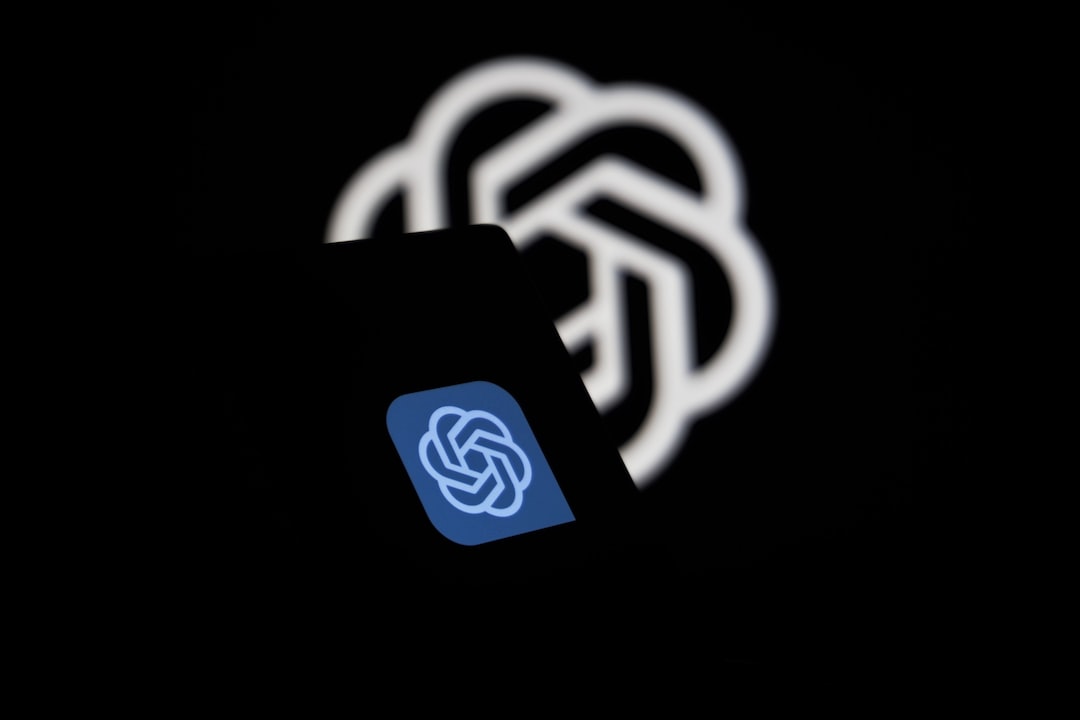 a close up of a cell phone with a logo on it