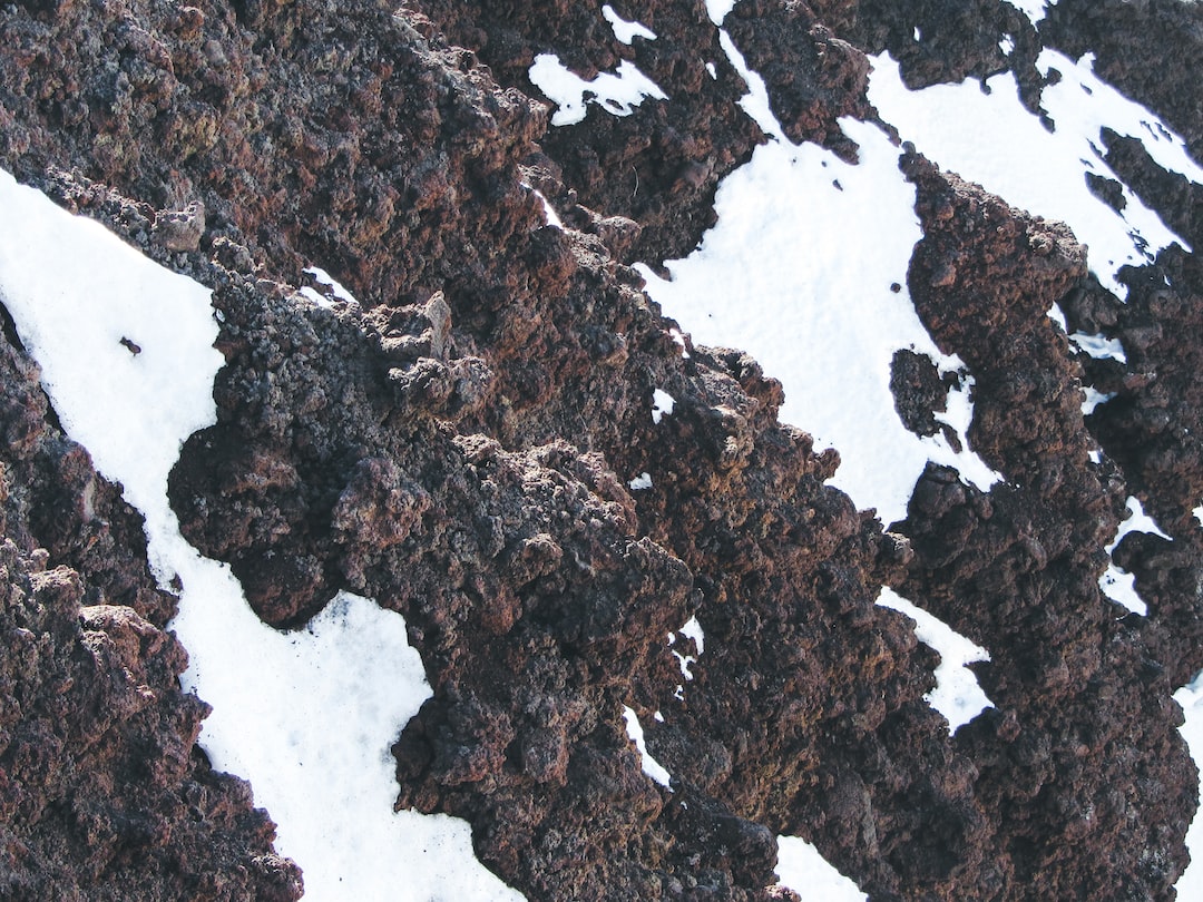 a rocky area with snow