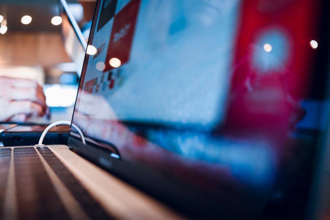 red car on the road during daytime