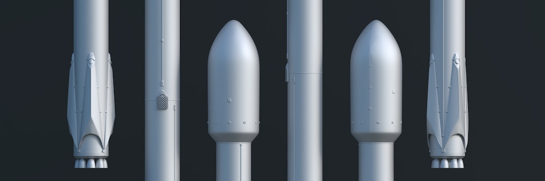 a group of four white rockets sitting next to each other