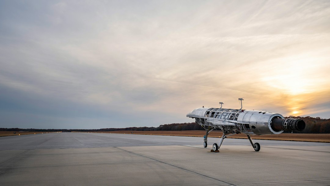 a small airplane sitting on top of an airport tarmac