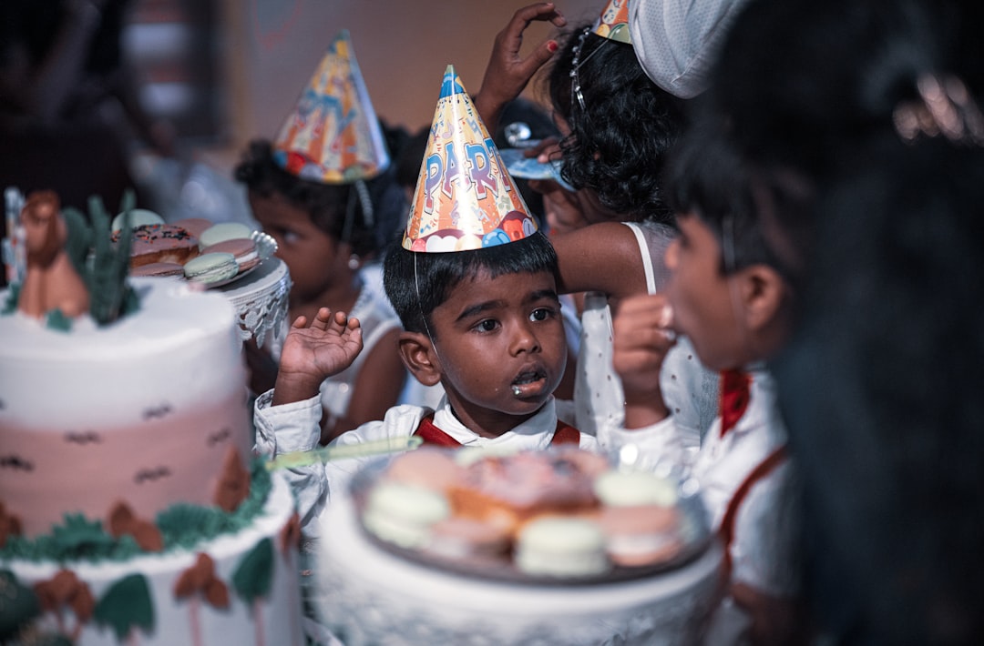 a group of kids with party hats on