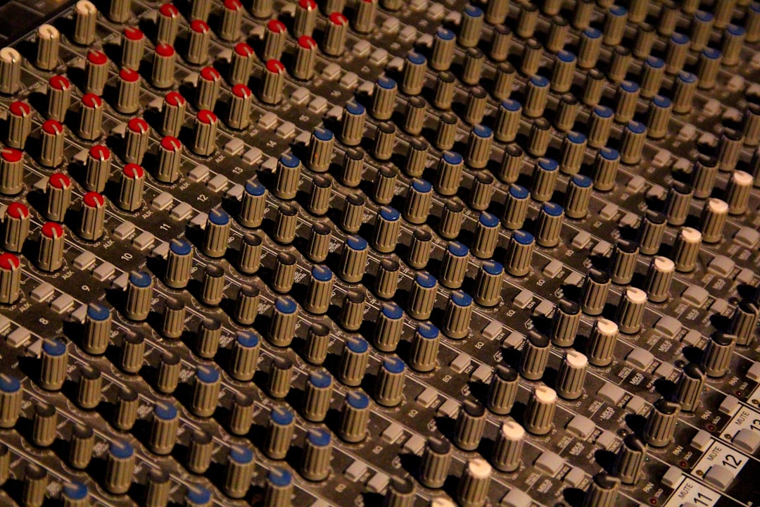 gray and blue DJ mixer