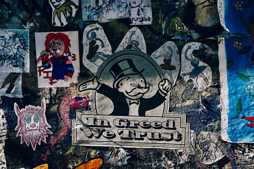 Monopoly's mr. monopoly in a graffiti collage.