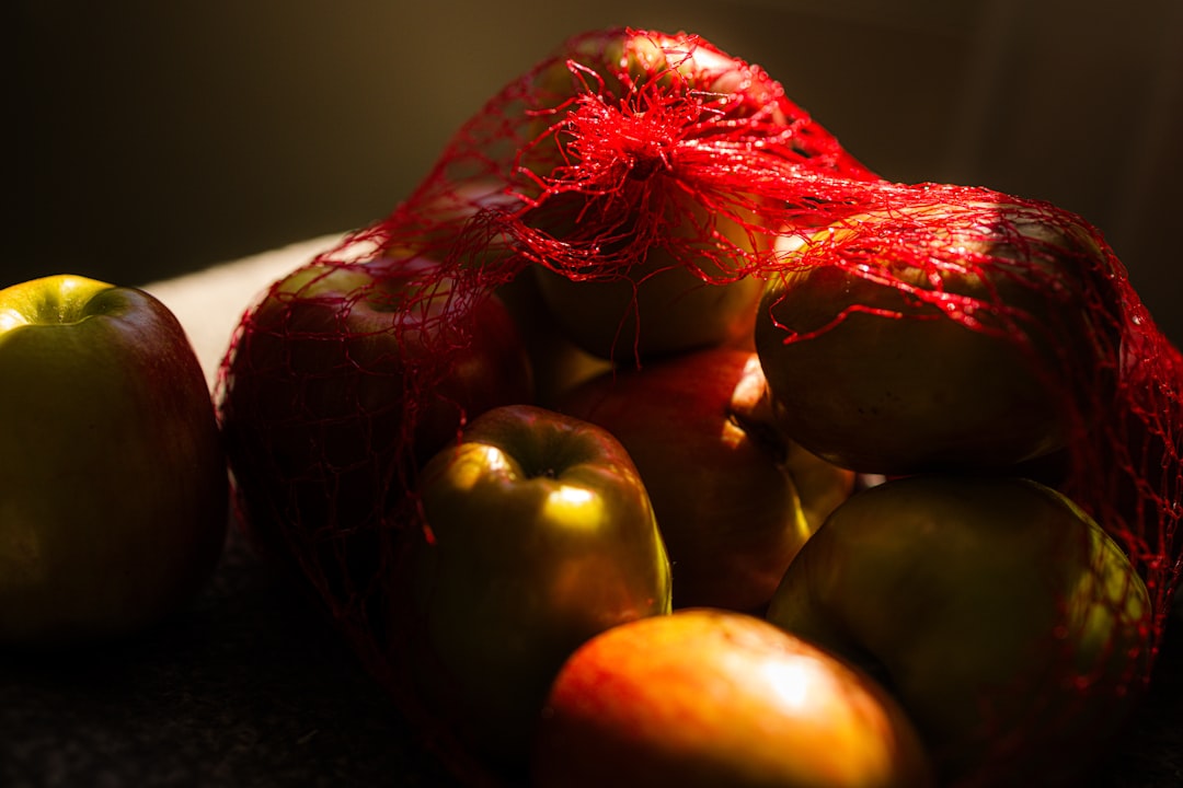 A pile of fruit sitting on top of a table