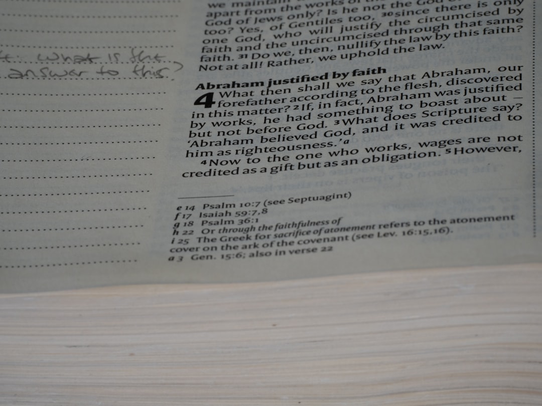 A close up of a book with writing on it