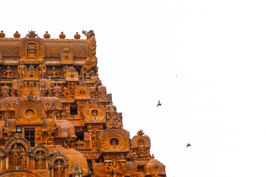 a tall tower with a clock on the top of it